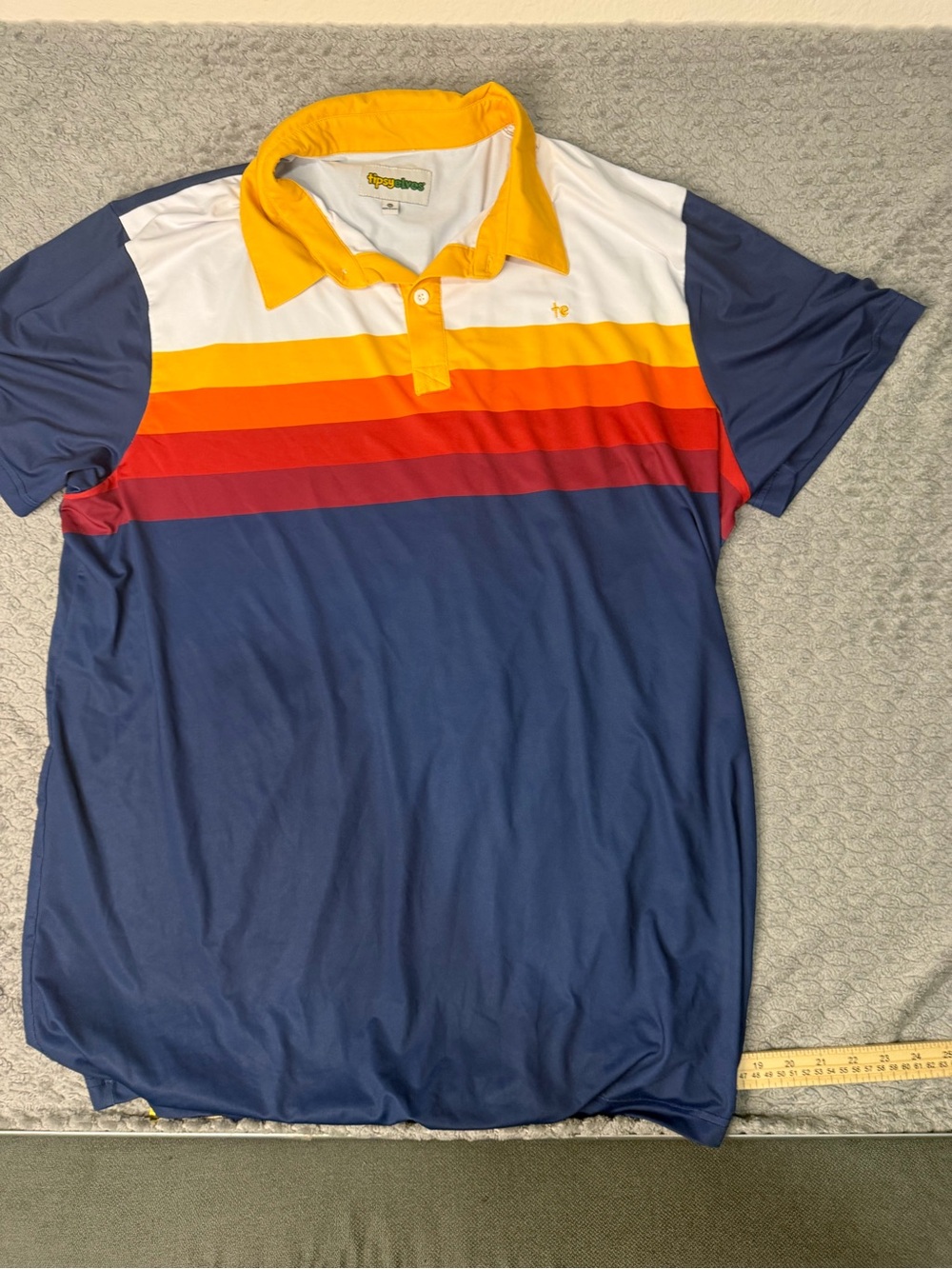 Tipsy Elves Navy Polo with Yellow, Orange & Red Stripes